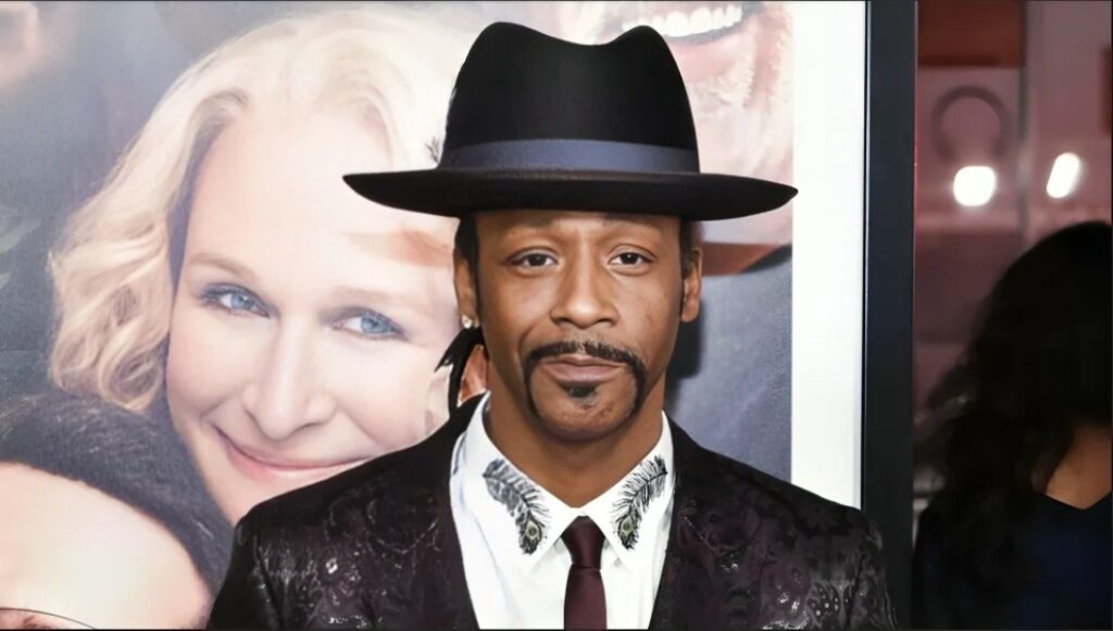Katt Williams in  black dress